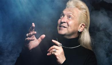 A poster advertising the show, featuring a picture of the character Clinton Baptiste