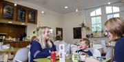 People eating in a cafeteria
