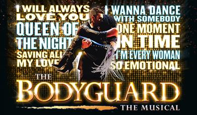 A picture of a man holding a woman in front of the names of songs from the musical