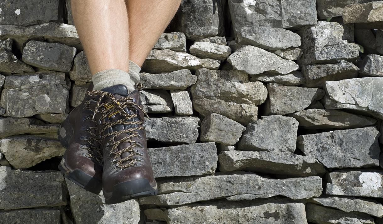 A picture of someone wearing walking boots