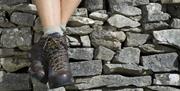 A picture of someone wearing walking boots