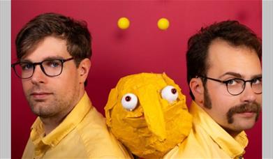 Two men and a puppet